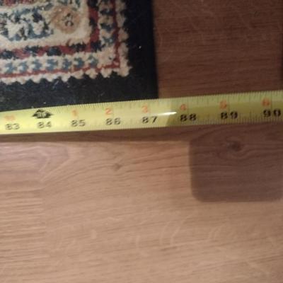 Area Rug- Measures Approx 62 1/2" x 87"