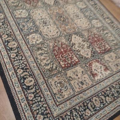 Area Rug- Measures Approx 62 1/2" x 87"