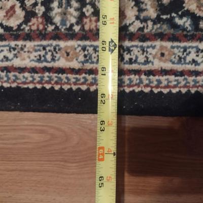 Area Rug- Measures Approx 62 1/2" x 87"