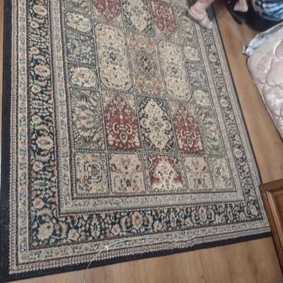 Area Rug- Measures Approx 62 1/2" x 87"