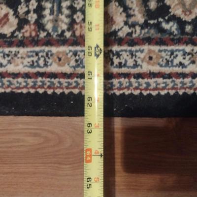 Area Rug- Measures Approx 62 1/2" x 87"