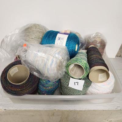 17 cones of multicolored yarn