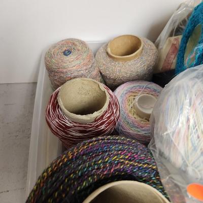 17 cones of multicolored yarn