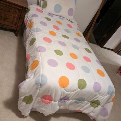 Nice Twin Bed with Bedding