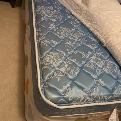 Nice Twin Bed with Bedding