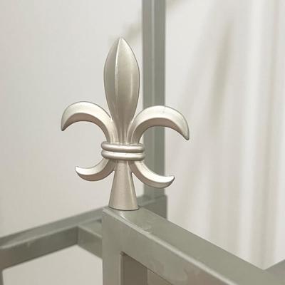 Metal Clothes Hanging Rack With Fleur De Lis Toppers