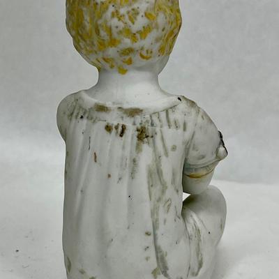 Antique Vintage Bisque Porcelain Figurine Child Baby sitting with fruit