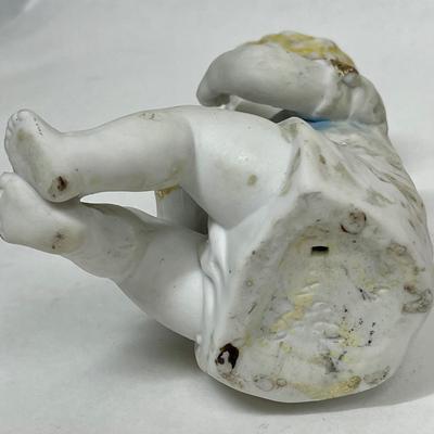 Antique Vintage Bisque Porcelain Figurine Child Baby sitting with fruit