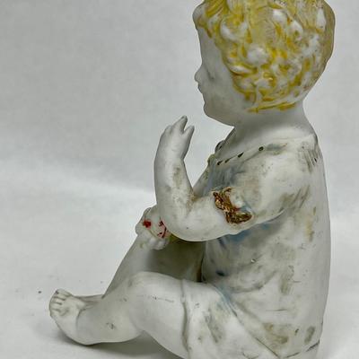 Antique Vintage Bisque Porcelain Figurine Child Baby sitting with fruit