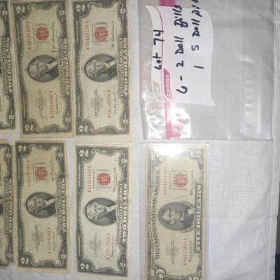 6 2 dollar bills 1 5 dollar bill