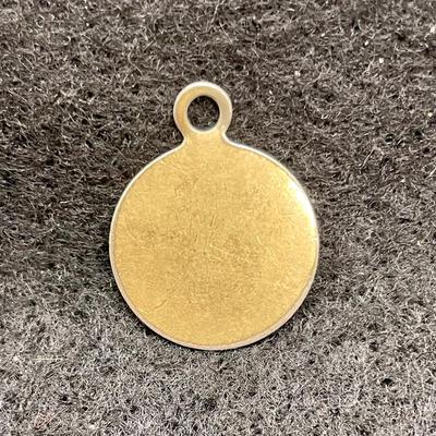 Jewelry Lot: (2) 10k Gold Fill Rings, (1) 12k Gold Charm, (1) Gold-tone Heart Charm