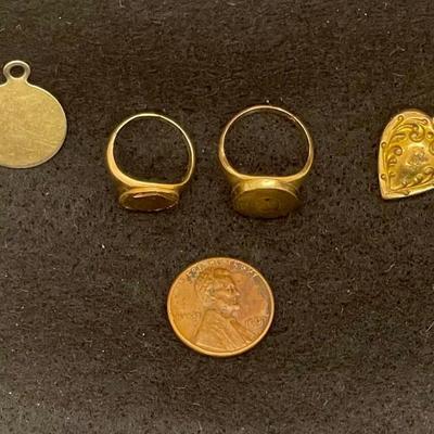 Jewelry Lot: (2) 10k Gold Fill Rings, (1) 12k Gold Charm, (1) Gold-tone Heart Charm