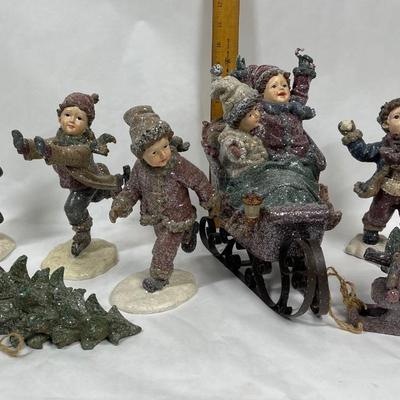 Set of Winter Christmas Themed Figurines Children on Skates and Sled
