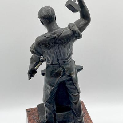 A Bronze Blacksmith & His Anvil Sculpture