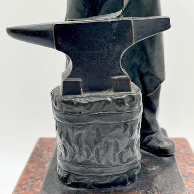 A Bronze Blacksmith & His Anvil Sculpture