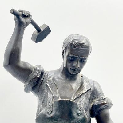 A Bronze Blacksmith & His Anvil Sculpture