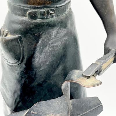 A Bronze Blacksmith & His Anvil Sculpture