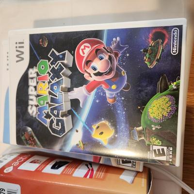 Large Lot of Wii Games, Console & Accessories Several Items still sealed. Super Mario Galaxy
