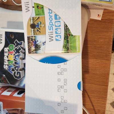 Large Lot of Wii Games, Console & Accessories Several Items still sealed. Super Mario Galaxy