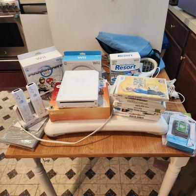 Large Lot of Wii Games, Console & Accessories Several Items still sealed. Super Mario Galaxy