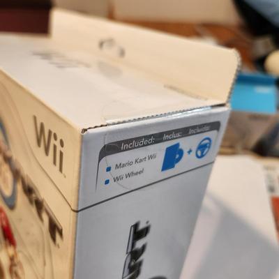 Large Lot of Wii Games, Console & Accessories Several Items still sealed. Super Mario Galaxy