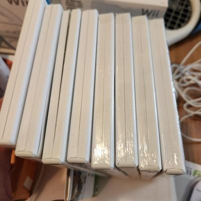 Large Lot of Wii Games, Console & Accessories Several Items still sealed. Super Mario Galaxy