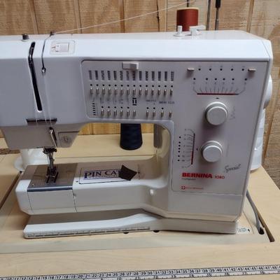 Bernina Model 1080 Sewing/Embroidery Machine with Work Cabinet and Notions