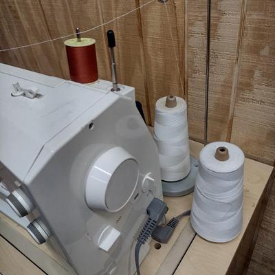 Bernina Model 1080 Sewing/Embroidery Machine with Work Cabinet and Notions