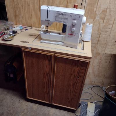 Bernina Model 1080 Sewing/Embroidery Machine with Work Cabinet and Notions