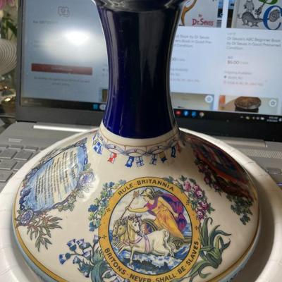 Vintage British Navy Pusser's Rum Empty Porcelain Bottle/Vase 7.5" Tall in VG Preowned Condition.