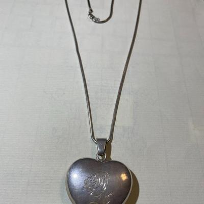 Vintage Sterling Silver Heavy Heart Pendant on a 24" Snake Chain Slightly Tarnished as Pictured.