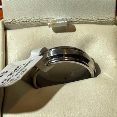 Stainless Steel Size 8.75 Wedding Band in Very Good NIB Condition as Pictured.