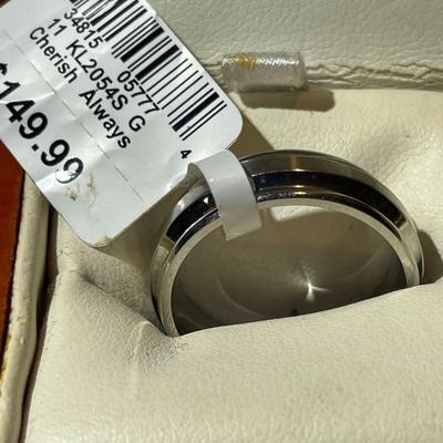 Stainless Steel Size 8.75 Wedding Band in Very Good NIB Condition as Pictured.