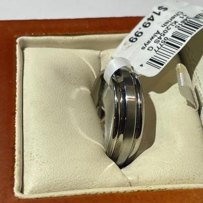 Stainless Steel Size 8.75 Wedding Band in Very Good NIB Condition as Pictured.