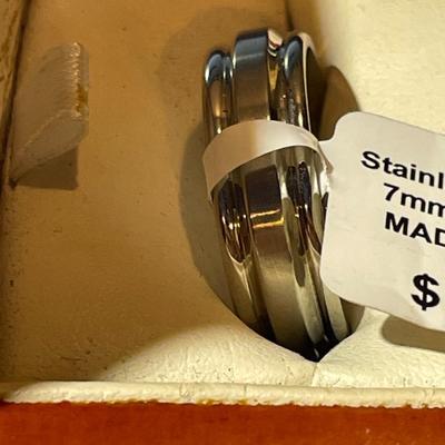 Stainless Steel Size 8.75 Wedding Band in Very Good NIB Condition as Pictured.