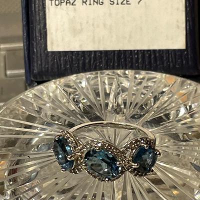 New Never Worn Sterling Silver 3-Stone Blue Topaz Ring Size-7 in New in Box Condition.