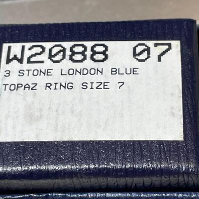 New Never Worn Sterling Silver 3-Stone Blue Topaz Ring Size-7 in New in Box Condition.