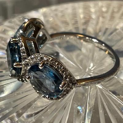 New Never Worn Sterling Silver 3-Stone Blue Topaz Ring Size-7 in New in Box Condition.