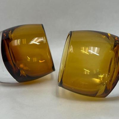 2 Amber candleholders with clear bottom