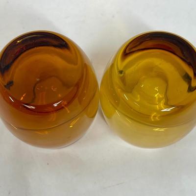 2 Amber candleholders with clear bottom