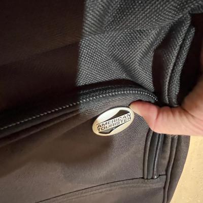 Another black suitcase