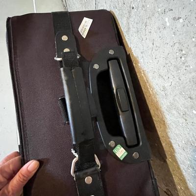 Another black suitcase