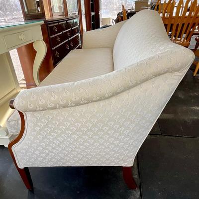 Lot# 033 Beautiful Vintage Upholstered Camelback Mahogany Sofa
