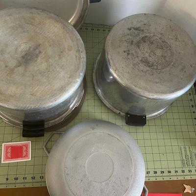 1 Pressure Cooker, 1 Pan, & 1 bottom of a pressure cooker