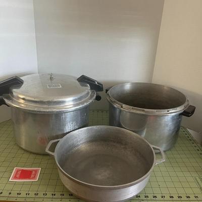 1 Pressure Cooker, 1 Pan, & 1 bottom of a pressure cooker