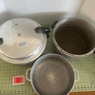 1 Pressure Cooker, 1 Pan, & 1 bottom of a pressure cooker