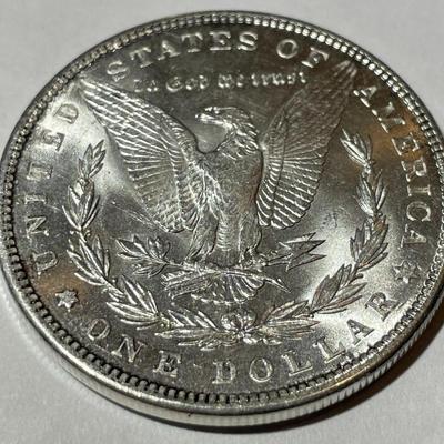 1889-P MS60 CONDITION MORGAN SILVER DOLLAR AS PICTURED.