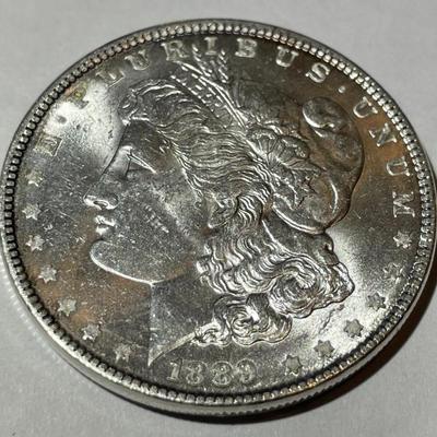 1889-P MS60 CONDITION MORGAN SILVER DOLLAR AS PICTURED.