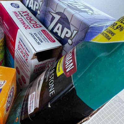 Box of Used and Opened Cleaning Products