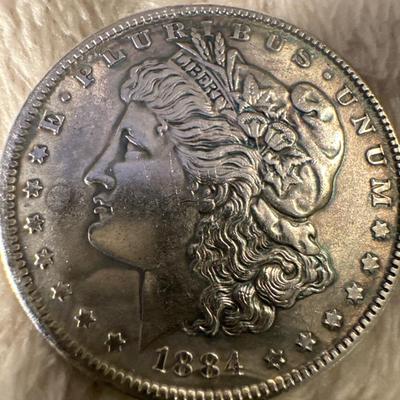1884 S MORGAN MS62